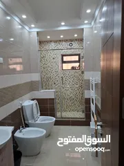  18 الدوار السابع شقه 2 نوم عماره جديده VIP  للعائلات فقط موقع مميز  يومي اسبوعي