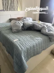  1 سرير من يكيا شبه جديد مع مرتبه من يكيا بعد