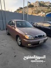  6 دايو لانوس موديل 1997 جير عادي ماتور 1500 سنتر اصلي جنط الاصلي فحص مرفق