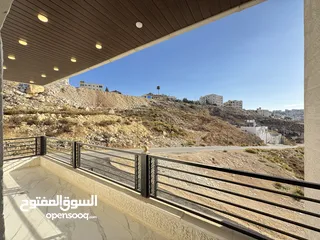 15 شقة طابق ارضي معلقة مساحة 165م بإطلالة دائمة للبيع في اجمل مناطق صويلح بالقرب من الجبيهة