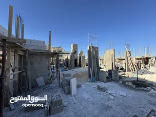  12 شقة في مرج  الحمام قرب دوار المرديني طابق أخير مع روف دوبليكس 135م وترس 80م