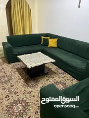  5 كنب وطاولة وخزانة تلفزيون ومروحة
