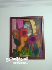  12 لوحات  رسم زيتي.. وتطريز