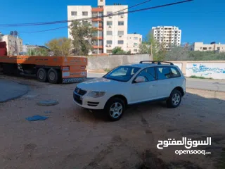  4 فولكس فاجن طوارق 2008 بحالة الوكالة  ماتور ديزل 3000 V6 عداد 145000 جير و ماتور و شصيات 100% وعلى ال