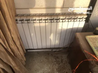  13 ماطور تدفئة مركزية مع خزان سولار مع الراديترات (المشعاعات)