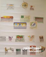  12 طوابع اصلية من كل بلدان العالم للبيع المستعجل الطابع ب دينار