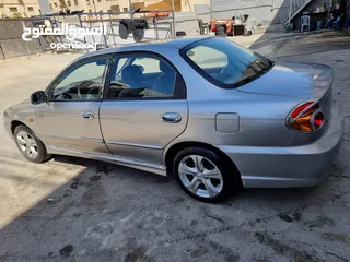  9 كيا سبيكترا 2001 بسعر 2400 جير عادي سياره نظيفه جدا  kia spectra 2001