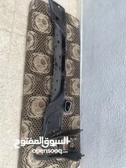  1 درع خلفي ايونك مستعمل مع فتحة كندشن وجزء جحشه