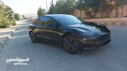  2 Tesla model 3 2023 standard plus zero