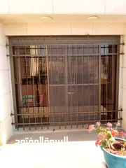  10 ابواب وشابيك حمايه و دربزينات  تفصيل