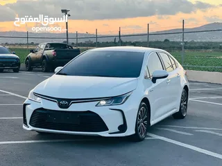  3 تيوتا كورولا هايبرد ترخيص 2022 فل بدون فتحة مميزة  ماتور 1800cc ( بنزين + كهرباء) 170Hp