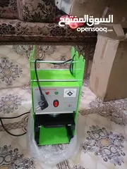  1 ماكنة غزل بنات مع مكبس كاسات استعمال بسيط مشروع كامل ودخل ممتاز سبب البيع السفر