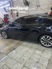  6 Kia optima turbo full option 2014