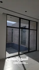  1 نوافذ النُخْبة لتنفيذ أعمال الألمنيوم والزجاج