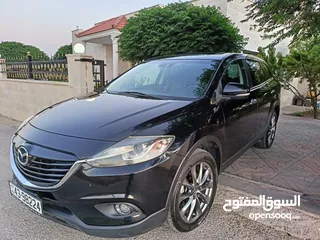  13 Mazda CX-9 بحالة الوكالة