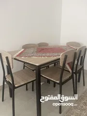  1 Dinning table with chairs