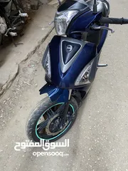  7 Sym st 200 cc عداد 21 الف حالة ممتازة