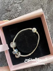  1 اسواره بندورا الاصليه مع التشارمز اصلين فقط ب 55دينار