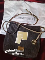  1 Michael Kors body bag / Coach  /Marie Claire