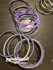  20 اساور بلاستيك بنفسجي، وفضي عدد 15