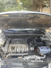  23 كيا لوتزي 2006 3 جيد لون سلفر ماتور 2000cc