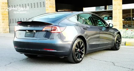  25 تيسلا 2023 MODEL 3 فحص كامل 4 جـيـد ممشى قليل 20 الف بحالة الوكالة لون فيراني مميز بسعر محرووق ولقطة
