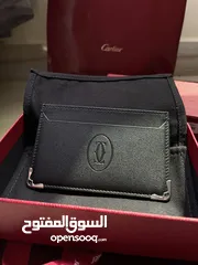  1 للبيع محفظة (كارد هولدر) من كارتيير جديدة اقل عن سعر السوق اصلية للبيع مع ضمان دبي مول Cartier