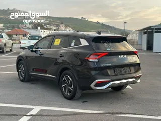  12 كايا سبورتاج /2022 فل بدون فتحة سقف  2x4 ///240Hp بنزين + كهرباء  ( Haybrid) 1600cc