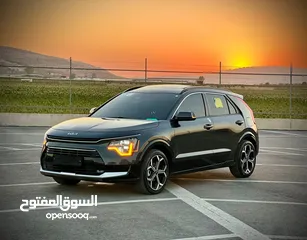  5 كايا نيرو  هايبرد (بنزين+كهرباء ) فل الفل فتحة سقف  /2022 عداد قليل 18000Km