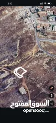  2 ارض على قمة الجبل اراضي المزرعة مقابل لكاسا مول على شارعين هيكليين دونم صافي بعد الشوارع تصنيف سكن أ