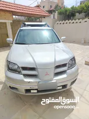  1 ميتسوبيشي اوت لاندر 2003