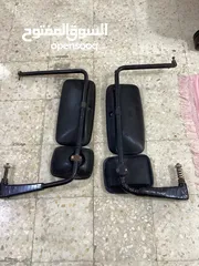  2 مرايا مع ذرعانهم