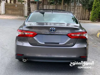 15 تيوتا كامري هايبرد لون فيراني  2020  اعلى صنف فل مسكر جمرك اليوم
