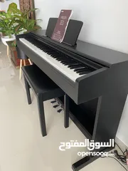  2 Yamaha digital piano Arius YDP-144B complete with bench.