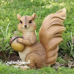  10 تمثال السنجاب  بالحجم الكبير يتوفر التمثال في وضعيتين مميزتين: سنجاب جالس بشكل لطيف