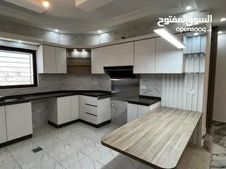  14 شقة استثمارية  للبيع بسعر مغري مع مطبخ وديكورات خشبية مميزة