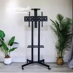  4 ستاند تلفزيون متحرّك بجودة عالية وتصميم عصري لو عندك شاشة كبيرة وبدك حامل قوي وثابت او بدك تنقل شاشة
