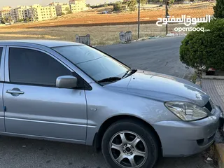  1 ميتسوبيشي لانسر 2009