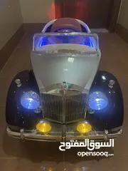  1 ‏ سيارة أطفال كهربائية مضاءة بالكامل وسماعات Children's electric car with lights and sound