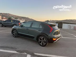  8 كايا نيرو  هايبرد (بنزين+كهرباء ) فل الفل  فتحة سقف  لون مميز اضافات مميزة  2022