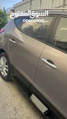  4 2009 ‏Hyundai توسان LX20 اربع ابواب، اللون فيراني، الكراسي جلد والسيارة 92,000 كيلو فقط وبحالة رائعة