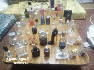  2 زجاجات عطور كوبي واصلي مستعملة فارغه