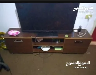  1 طاوله جديده وكاله نضيفه ميه الميه خشب ممتاز اربع دروج