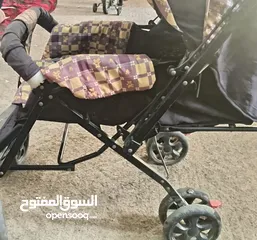  4 عرباية خارجية للشارع بلون كحلي مناسب لكلا الجنسين
