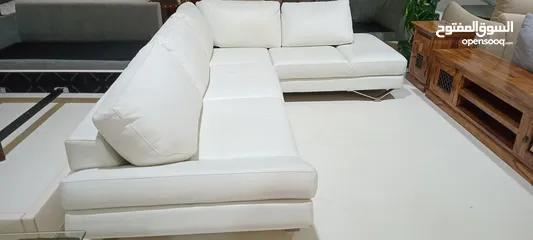  3 leather sectional sofa from natuzzi,   with excellent condition and free delivery all over United AE