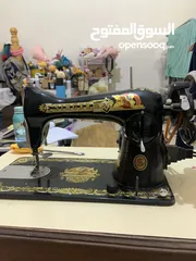  1 ماكينة الخياطة سنجر