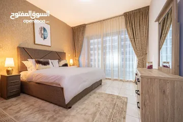  25 دبي لاند SKYCOURT  غرفة وصالة  مفروشة  سوبرلوكس مع بلكونه-إيجار شهري شامل
