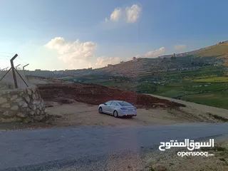  5 أرض للبيع في دحل قرية خطلة مساحتها 3400 م م
