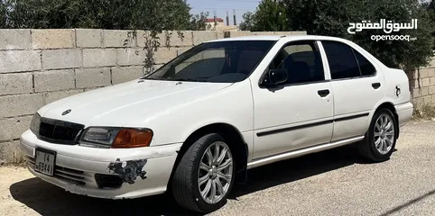  9 نيسان صني 1999 وارد ياباني ماتور 1500 قطارة بنزين ...... قابل للتفاوض والشرا ما بقصر معه ...