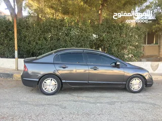  4 هوندا سيفيك هايبرد 2006